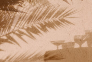 Silhouette image of people dance in disco night club to music from DJ on stage . New year night party and nightlife concept .